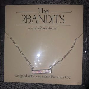2 Bandits silver necklace- brand new in packaging